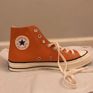 Orange Converse High tops